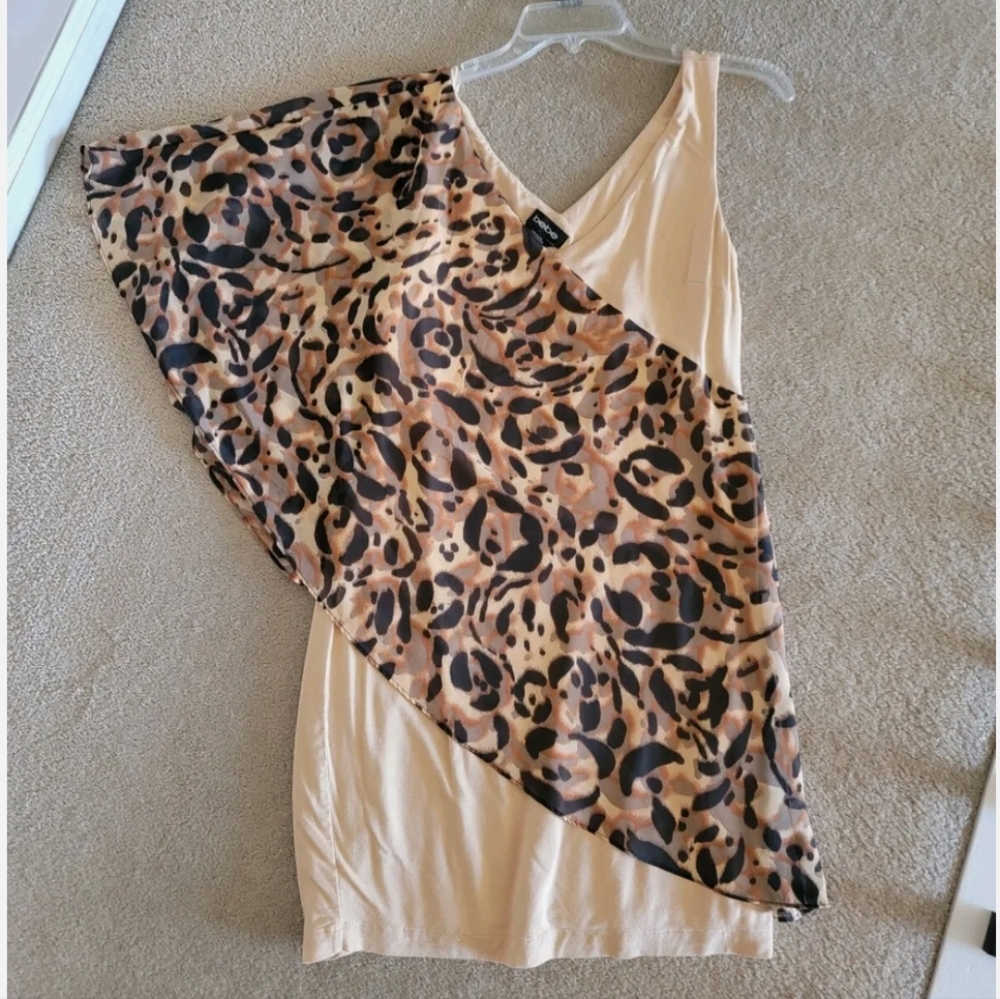 Bebe size size large animal print asymmetrical dress.